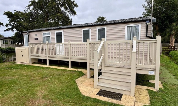 Clacton-on-Sea House | Cosy 8 berth caravan with decking and lake-views at Weeley Bridge ref 69001LV