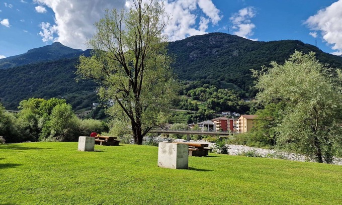 Roveredo Apartment | Cosy apartment for 4 guests with terrace, panoramic view and parking