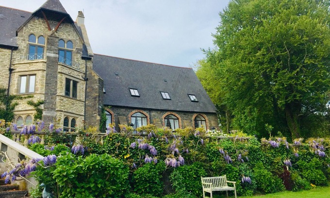 Lostwithiel Cottage | Cosy chapel cottage at Peregrine Hall with pool and walking distance into town