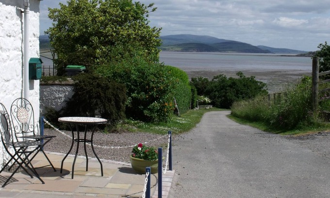 Sandyhills Cottage | Cosy cottage in spectacular location overlooking Balcary Bay