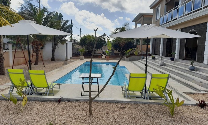 Trou aux Biches Apartment | COTOMILI ACCOMMODATION WITH SWIMMING POOL