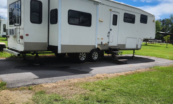 Cottondale RV Rental | Cougar RV in beautiful camp ground.