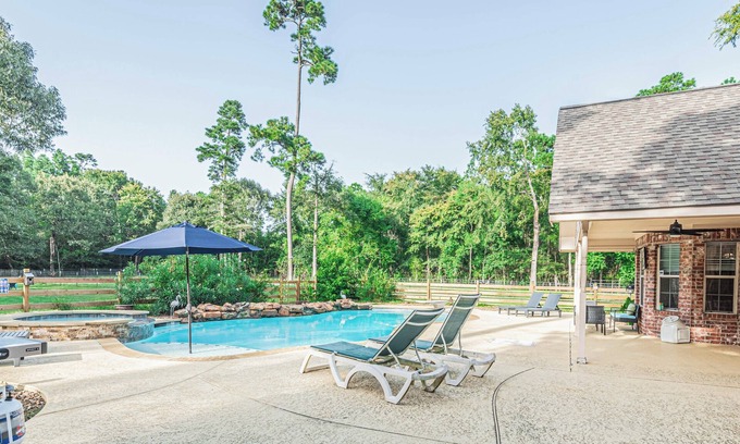 Magnolia House | Country Getaway Magnolia Forest Home in10 Acre Lot