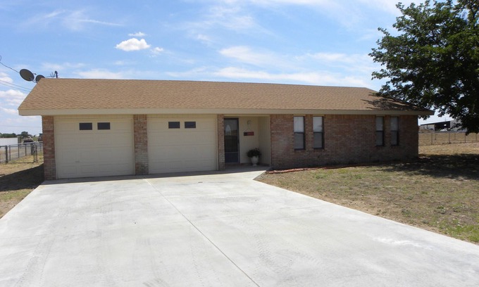 Hobbs House | Country Haven has 3 bedrooms and 2 baths. A kitchen, living room and dining.