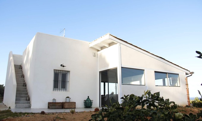 Santa Flavia Villa | Country house with sea view between citrus fruits, prickly pears and Mediterranean perfumes