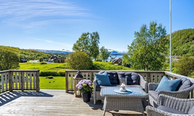 Tverlandet House | Countryside Holiday Home in Norwegian Fjord with Mountain Views & Serene Gardens