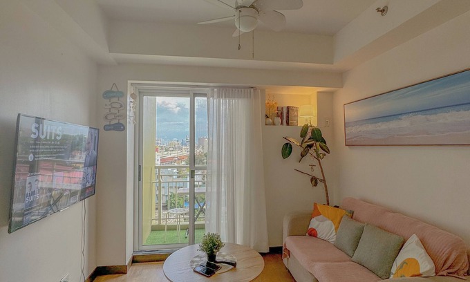 A. Bonifacio Condo | Cozy 1-bedroom condo in wonderful Quezon City with WiFi, AC, Pool view, Netflix