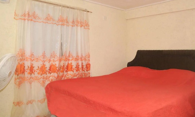 Maynards House | Cozy 2 bedroom air conditioned 1 bathroom apartment with swimming pool .