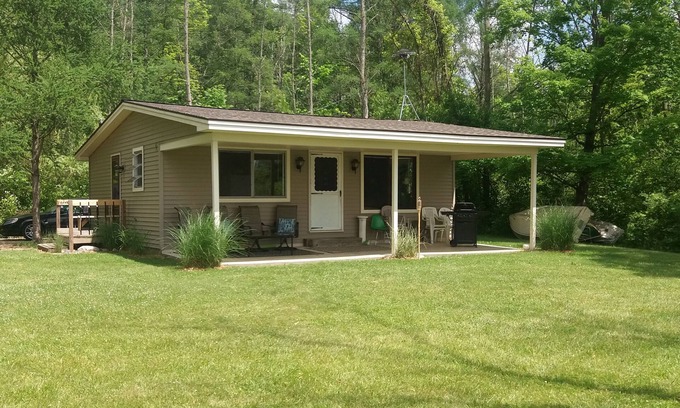 Allegan Cottage | Cozy 2-bedroom Waterfront Cottage with 80' dock on 2.5 Acres. Privacy Galore!
