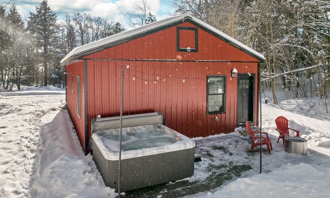Norwich House | Cozy 2BR/1BA cabin for 6. Fireplace, outdoor fire pit, hot tub, and soaking tub.