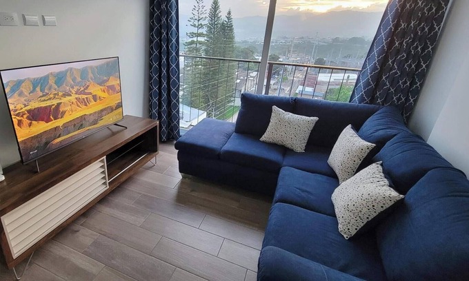Zona 12 Apartment | Cozy apartment, your family will be close to everything. City & volcanoes views.