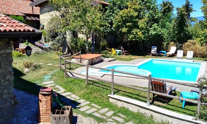 Mulazzo Apartment | Cozy apartment in small hamlet, with pool and views of the Apuan Alps