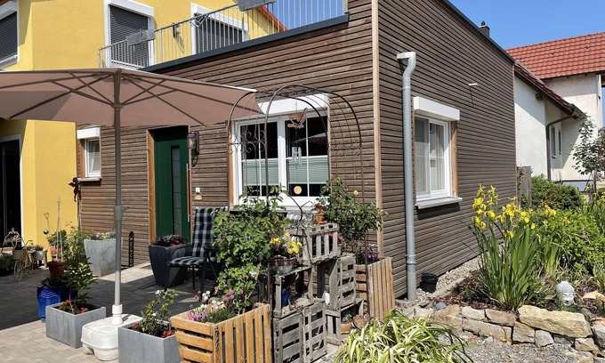 Segnitz Apartment | Cozy barrier-free FEWO in new building directly between vineyards and the Main river
