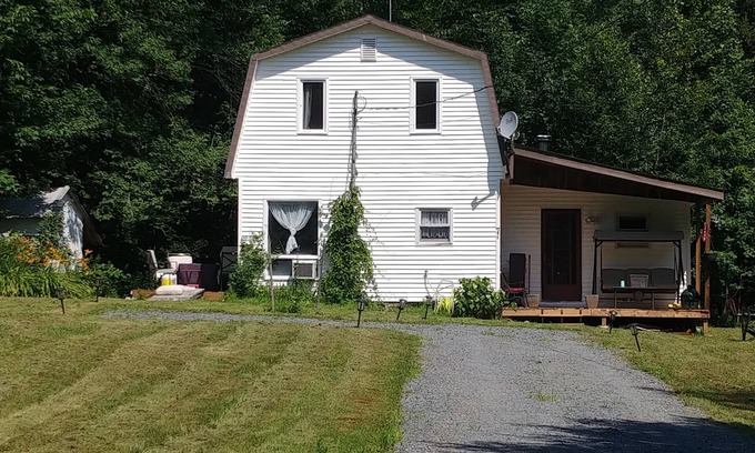 Barss Corner House | Cozy Cabin in Barss Corner with hot tub. Pet-Friendly!