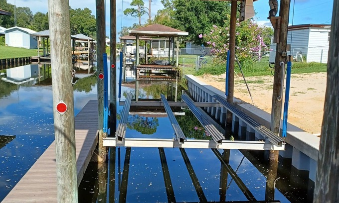 Highland House | Cozy canal front home. Minutes from Sebring International Raceway.