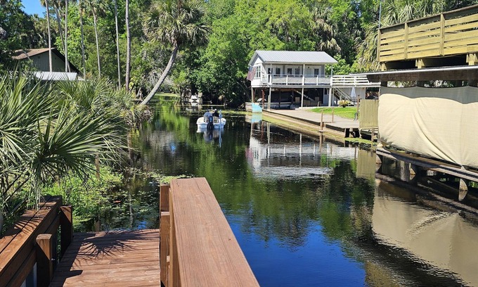 Astor House | Cozy canal front house with its own boat ramp and dock. Amazing waterfront view.