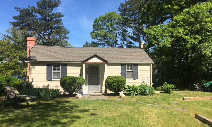 East Falmouth Cottage | Cozy Cape Cod cottage overlooking Jenkins Pond; with private beach & dock.