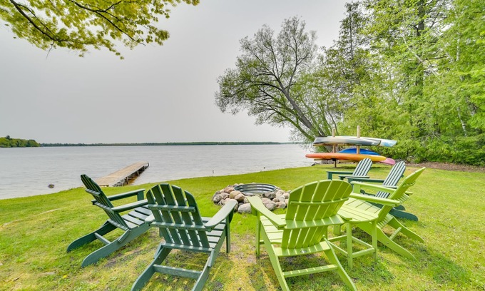 Carp Lake Cottage | Cozy Carp Lake Cottage w/Dock, Kayaks & Fire Pit