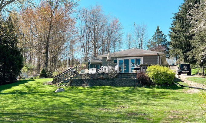 Gobles Cottage | Cozy Cottage Lakefront View - Paddle Board, Kayak, Hot Tub and more!