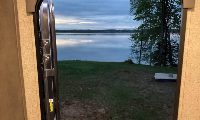 McMillan Cottage | Cozy couples camper with your own private 100ft lake front.