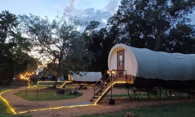 Putnam Hall Cabin | Cozy Covered Family Wagon on Rooterville’s Working Farm and Animal Sanctuary