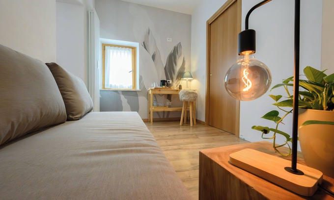 Illasi House | Cozy deluxe room for 4 people with private bathroom