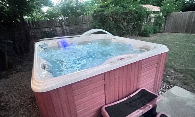 Wichita House | Cozy house in quiet neighborhood with hot tub, fire pit, and arcade games!