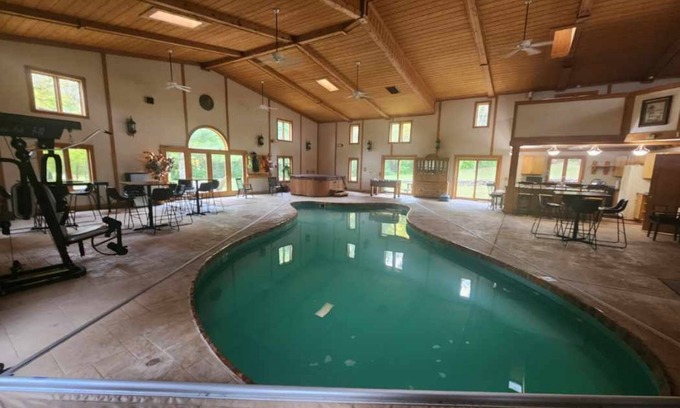 Troy Cabin | Cozy lodge with indoor pool, hot tub, loft and more! Great for a close getaway!