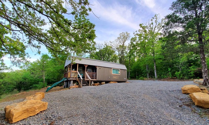 Mead Cabin | Cozy tiny cabin nested in the trees in a lake community, peaceful countryside.