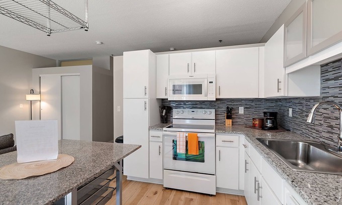 Mill District Apartment | CozySuites at Mill District