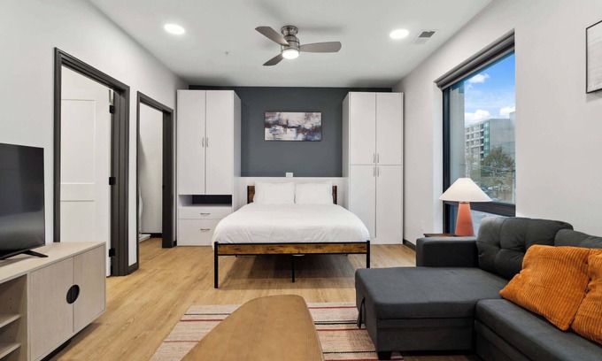 Lockerbie Square Apartment | CozySuites Mass with parking, lounge & roof deck #24