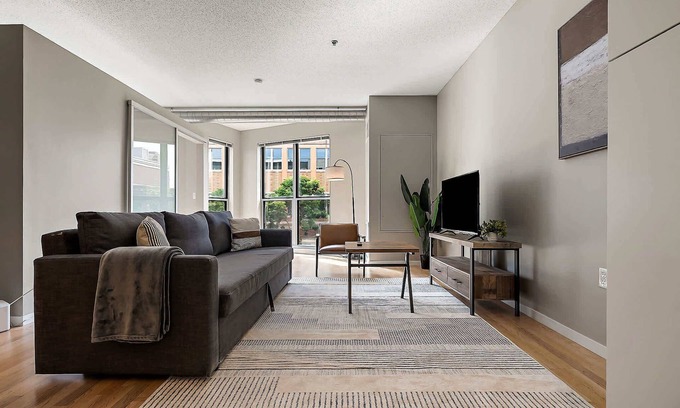 Mill District Apartment | CozySuites Mill District with pool, gym #12