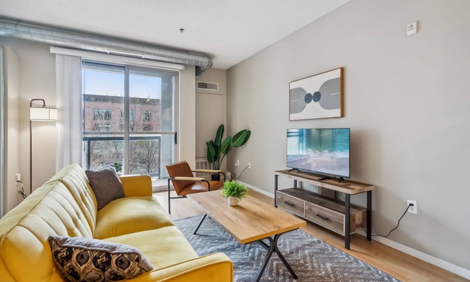 Mill District Apartment | CozySuites Mill District with pool, gym #06