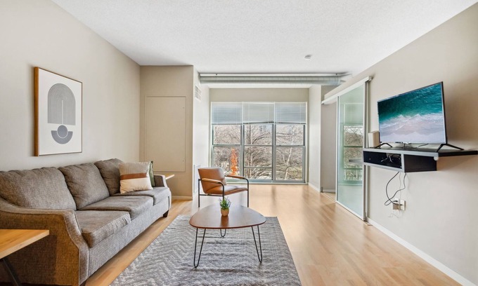 Mill District Apartment | CozySuites Mill District with pool, gym #08