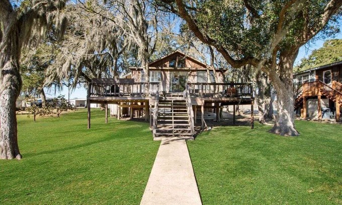 Cedar Lane House | Creekfront Cottage w/Boat Lift & Pier