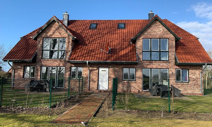 Vollerwiek Apartment | Dünentraum, Ferienwohnung in "De Feerjenhusen" am Haubarg von Vollerwiek