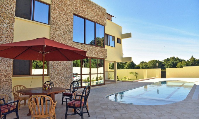 Galu Beach House | Delightful 5-bedroom apartment in Diani located in a green, serene neighborhood