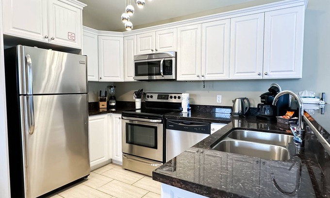 Stanley Bridge Villa | Deluxe Two Bedroom with Outdoor Hot Tub & Fireplace