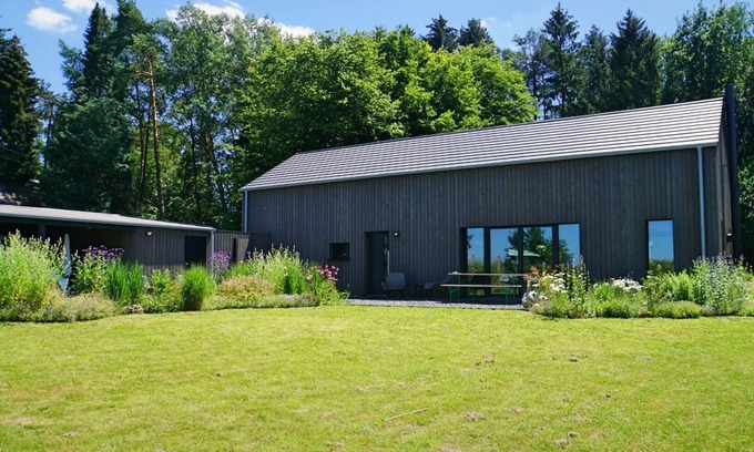 Breitscheid Villa | Design home with large fenced natural garden & fireplace