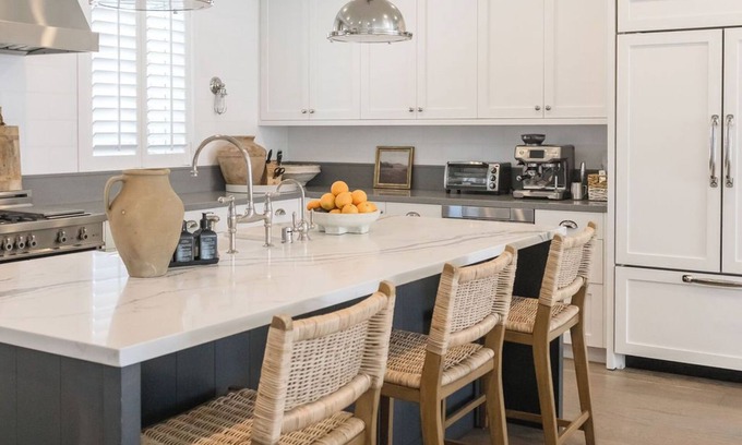The Strand House | Designer 4-bedroom house in the heart of Downtown MB!