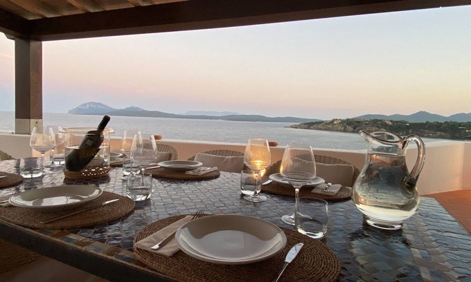 Porto Rotondo Apartment | Designer apartment overlooking the bay. Shared pool, access to the sea