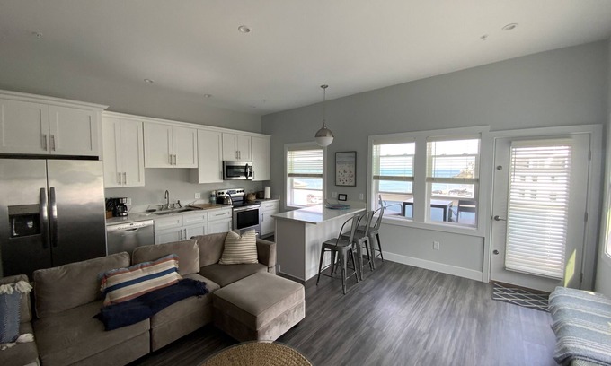 Hull House | Direct Ocean Front Condo with large wrap around balcony