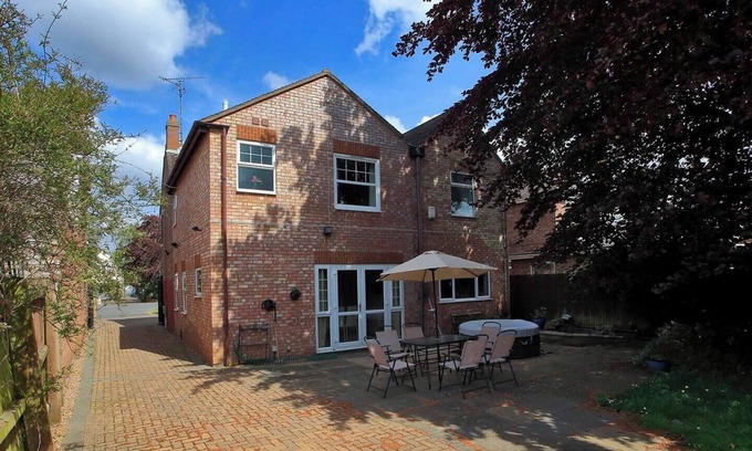 Newborough House | Discover 1340 Lincoln Road, a spacious 6-bed detached house in serene Werrington Village