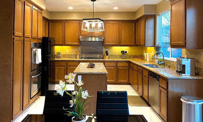 Mira Loma House | Discover comfort in our 5-bedroom retreat, just a hop away from Ontario Mills