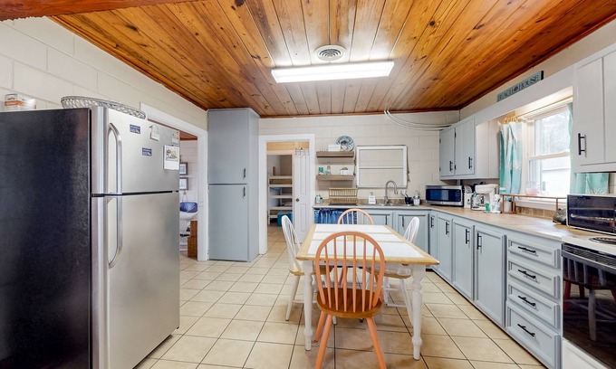 Morehead City House | Dog-friendly home near water with foosball, bikes, grill, outdoor shower, & W/D