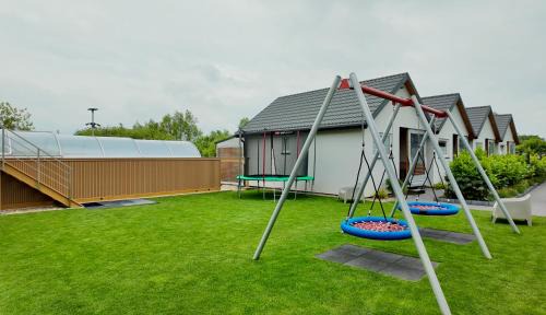 Sarbinowo Cabin | Domki letniskowe Sarbinowska Jaskółka