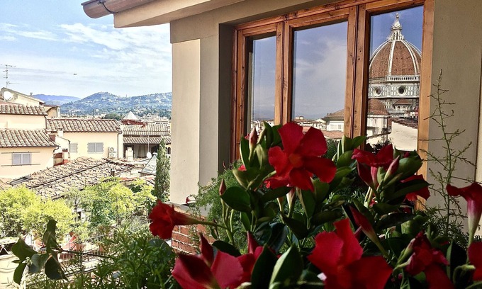 Sant' Ambrogio Apartment | Donati Tower's Loggia: spectacular view of the Duomo, in the heart of Florence
