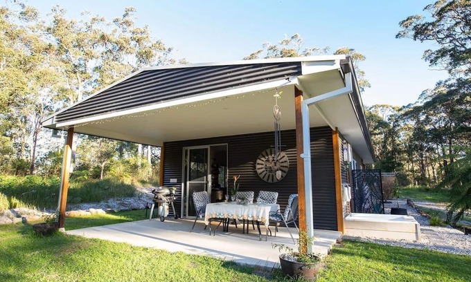 Deer Vale Cabin | Dorrigo accommodation, twin outdoor baths under the stars,120 ac. river & walks