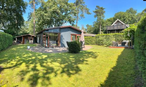 Beekbergen-Zuid House | Dubbele chalet op recreatiepark Topparken op de Veluwe in Beekbergen met grote vrije tuin en eigen parkeerplaats