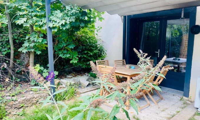Centre Apartment | Duplex climatisé avec une terrasse sur jardin